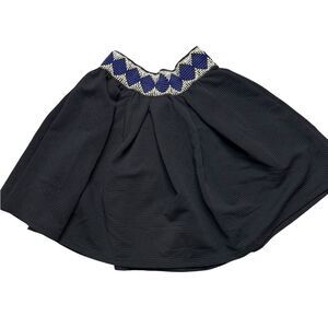 Black Skirt with Blue and White Patterned Waistband